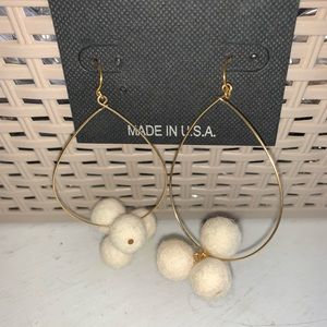 One pair Pom and goldtone 3” dangle earrings with J hooks. 4 cream poms NWT